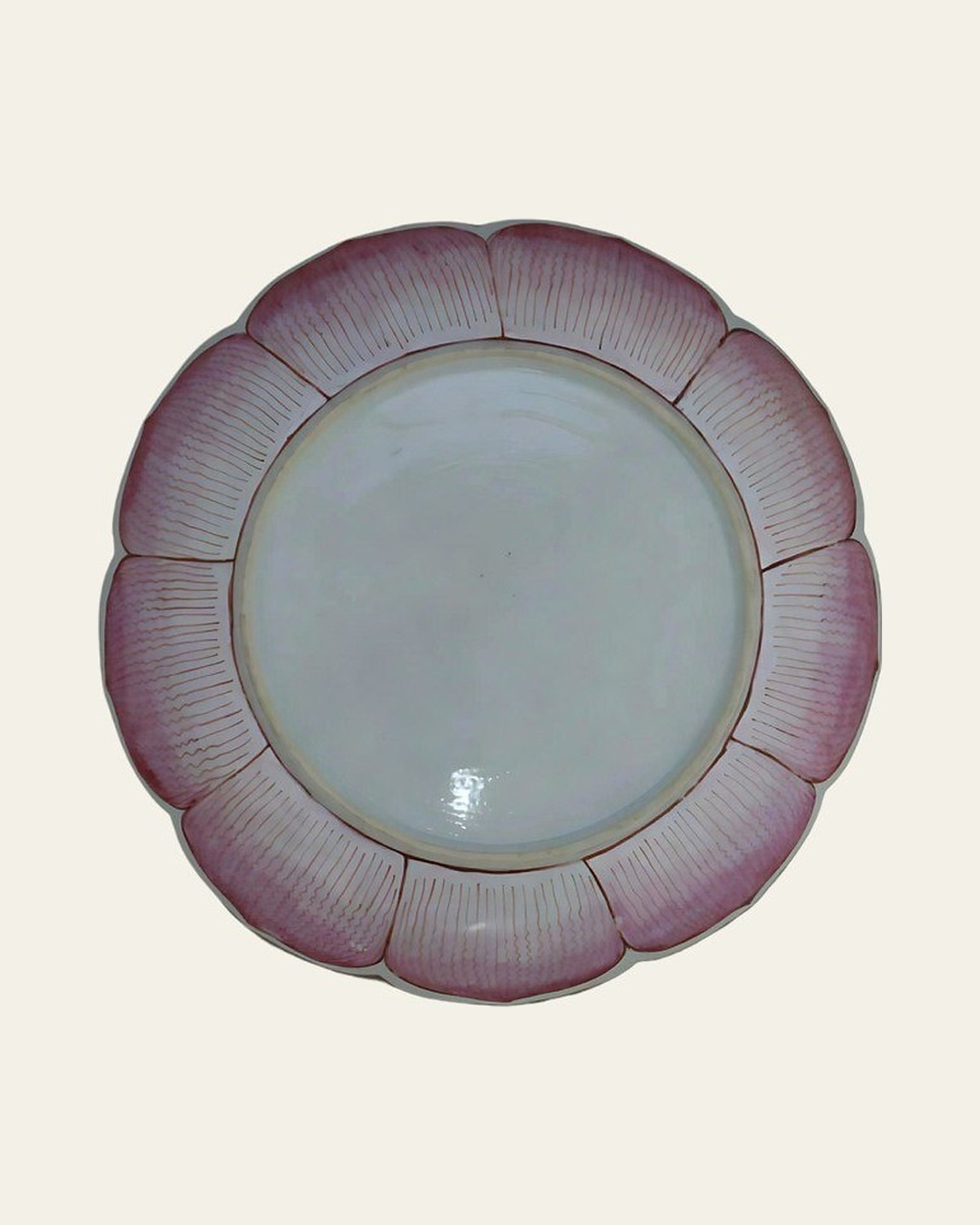 Reverse of the Qing dynasty famille rose porcelain dish after conservation and restoration treatment.