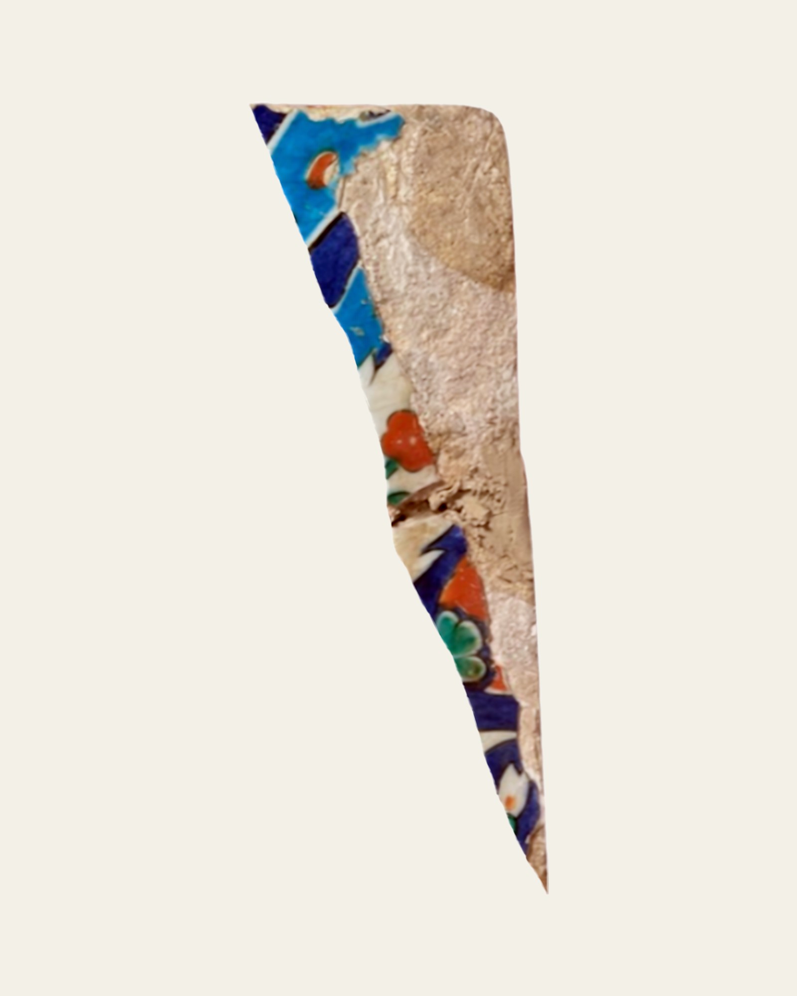 Close-up of the upper-right corner of a glazed fritware tile before treatment, showing loss, break and earlier restoration.